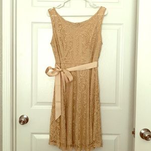 Nude lace dress with bow